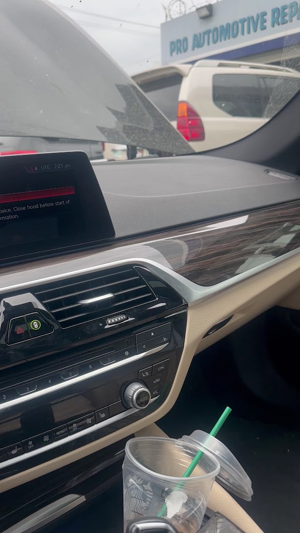 Mobile auto electrician performing on-site diagnostics