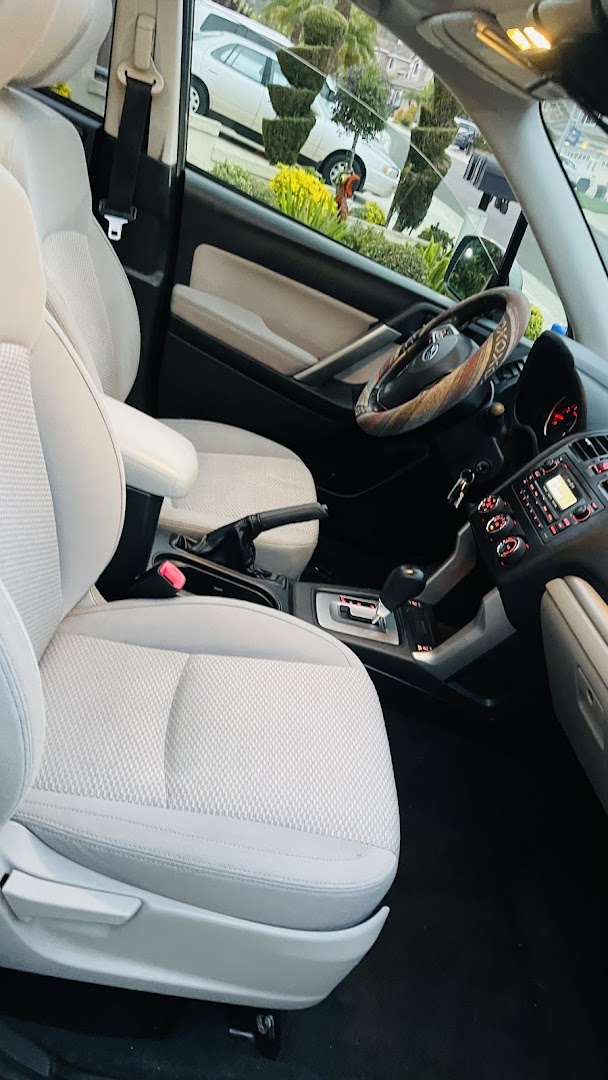 Dashboard and steering wheel area — detailed to spotless condition