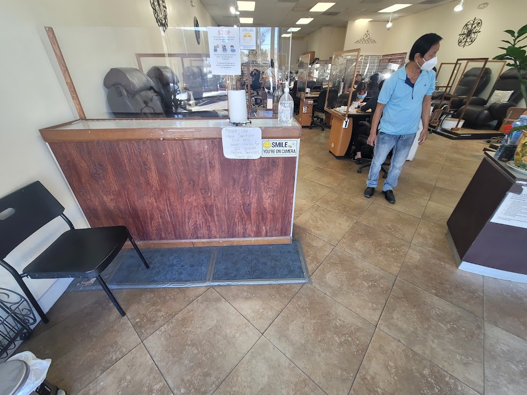 Epic Nails salon interior — reception desk and workstations