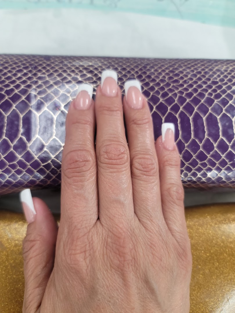 Classic white French tip acrylic nails, clean square shape