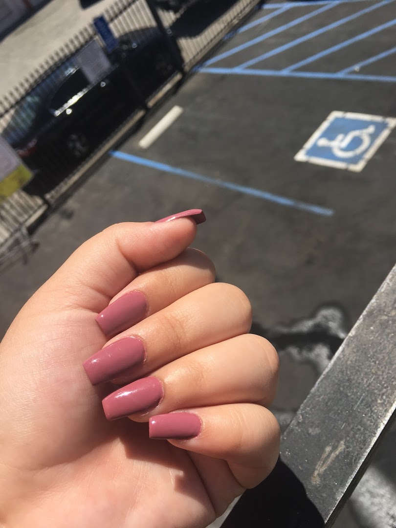 Nail technician working at Fancy Nails