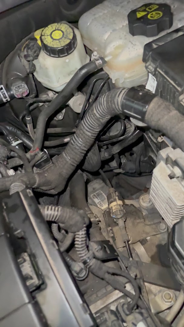 Close-up of vehicle repair work at Flores Mobile Auto Repair