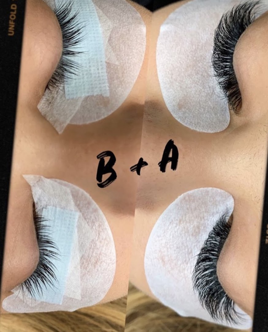 Close-up of lash extension craftsmanship — natural, seamless application