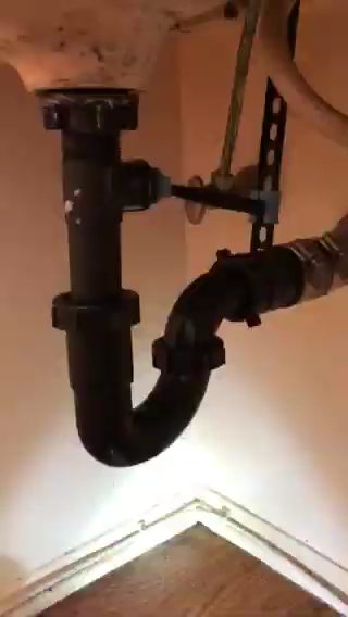 Plumber working on pipe installation — LA Local Plumbing