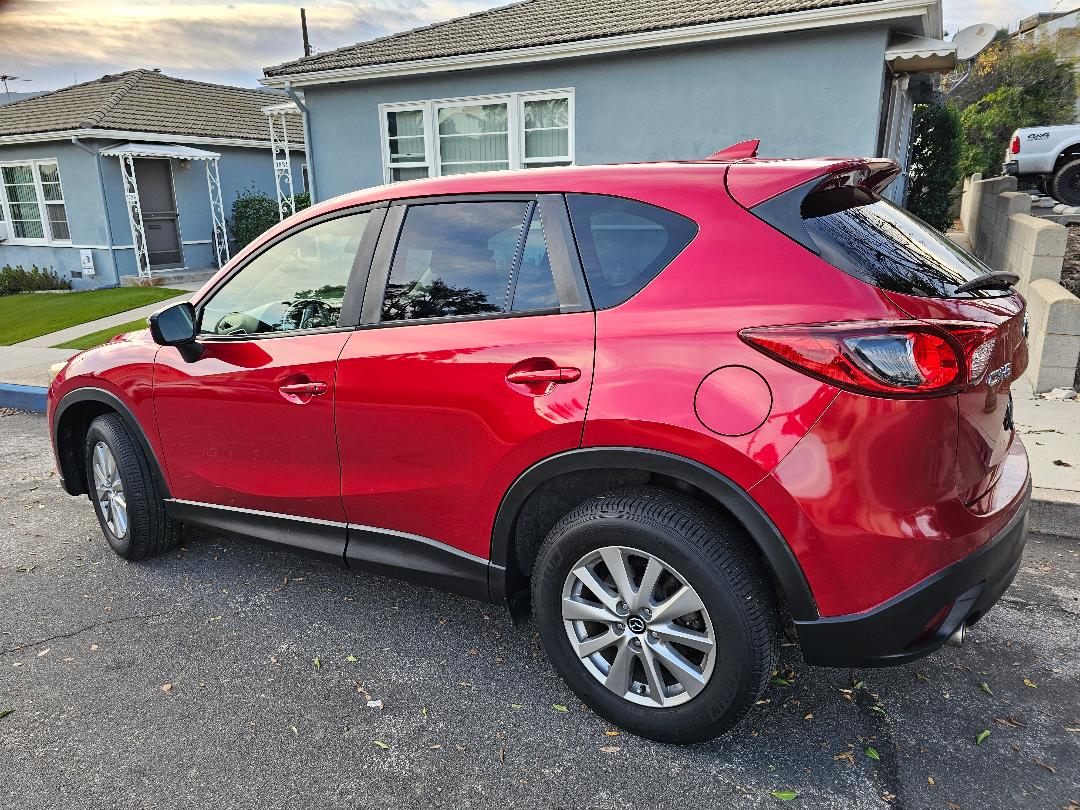 Red Mazda CX-5 after precision detailing by Heno at Ocean Auto Detail, Glendale CA
