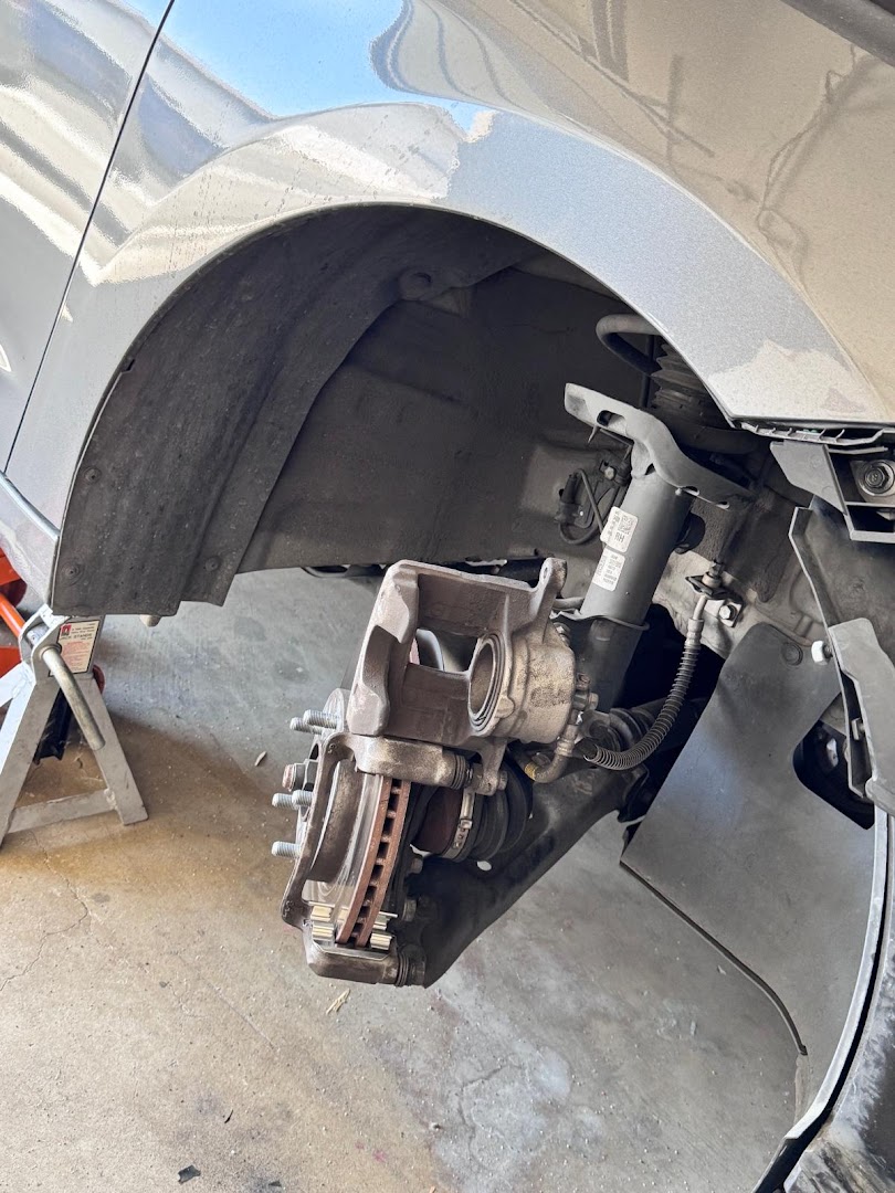 Close-up of brake assembly work at customer location