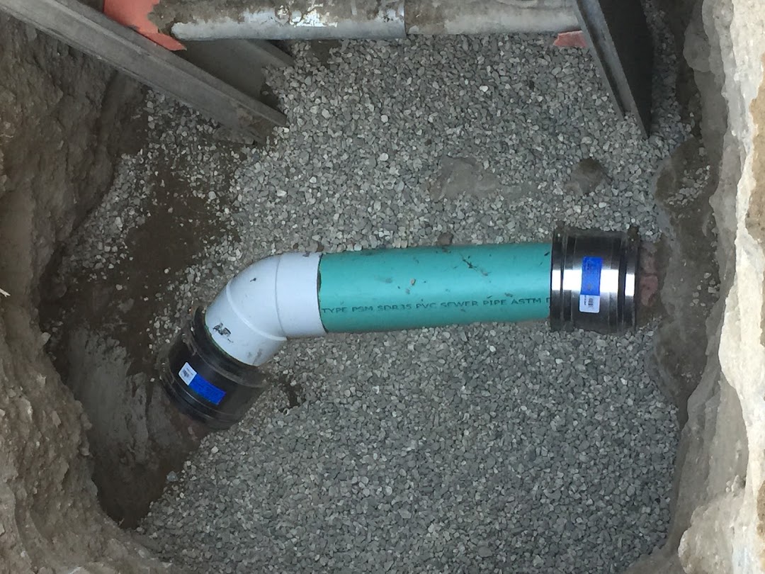 Close-up of a drain pipe repair — The Drain Defender's craft