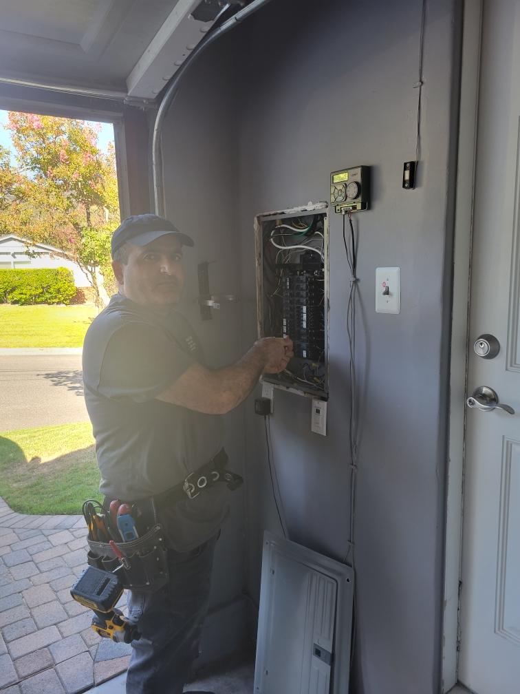 Vardan on-site working on a residential breaker panel